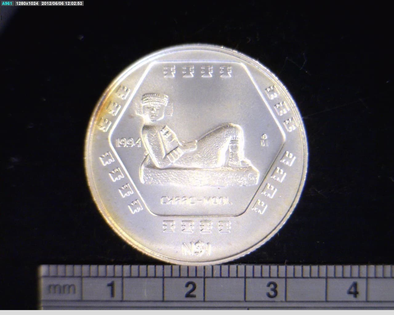 1 Nuevo Peso Chaac Mool 1994 · Inventario Banxico 19250 (reverso)