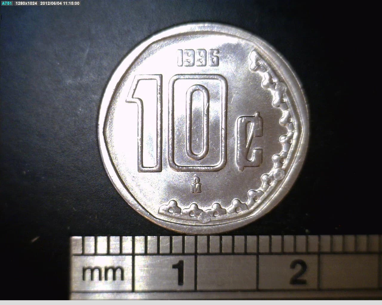 10 Acero inoxidable 1996 . Inventario Banxico 19035 (reverso)