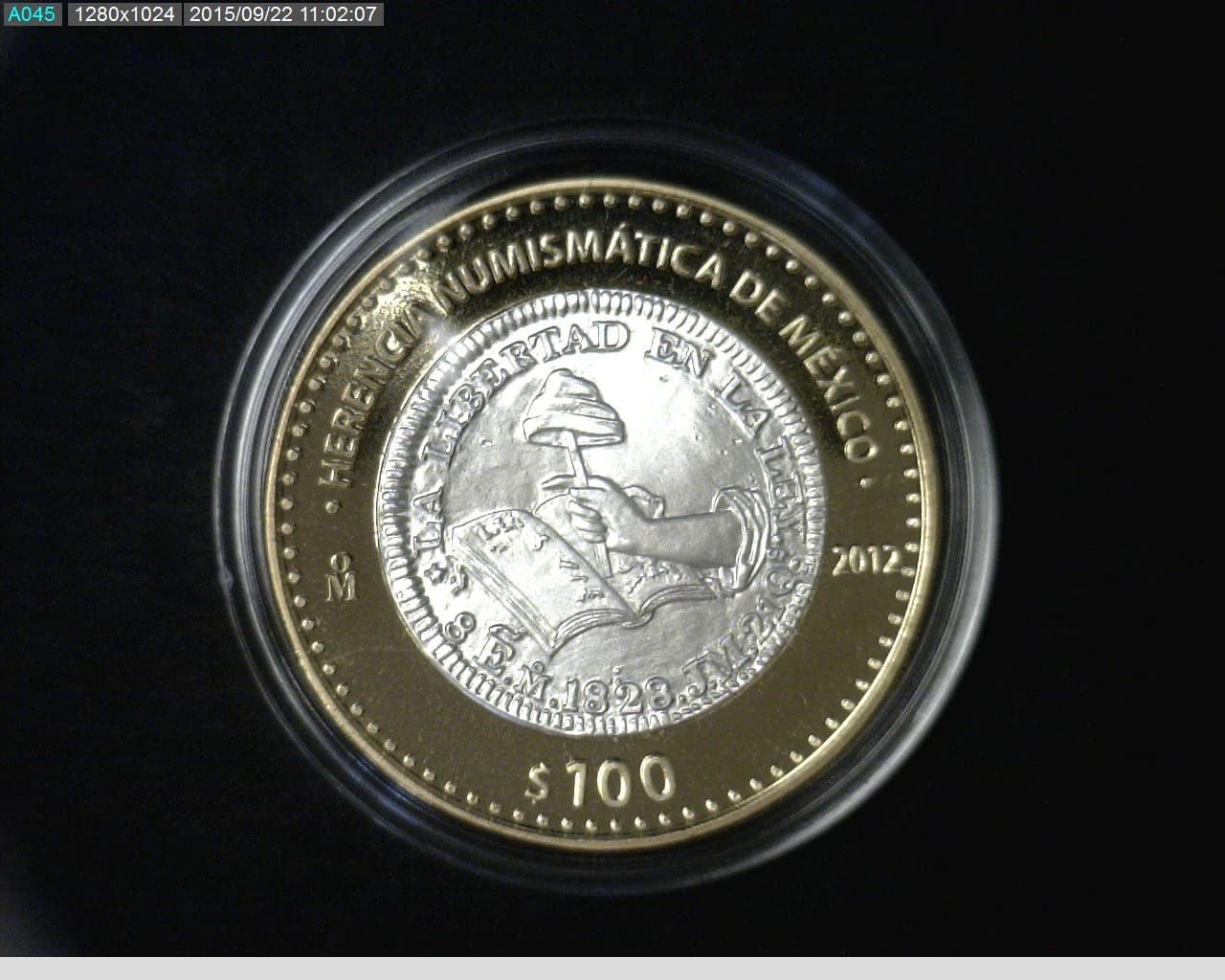 100 Pesos Herencia Numismatica II, Peso de Manita 2012 · Reverso