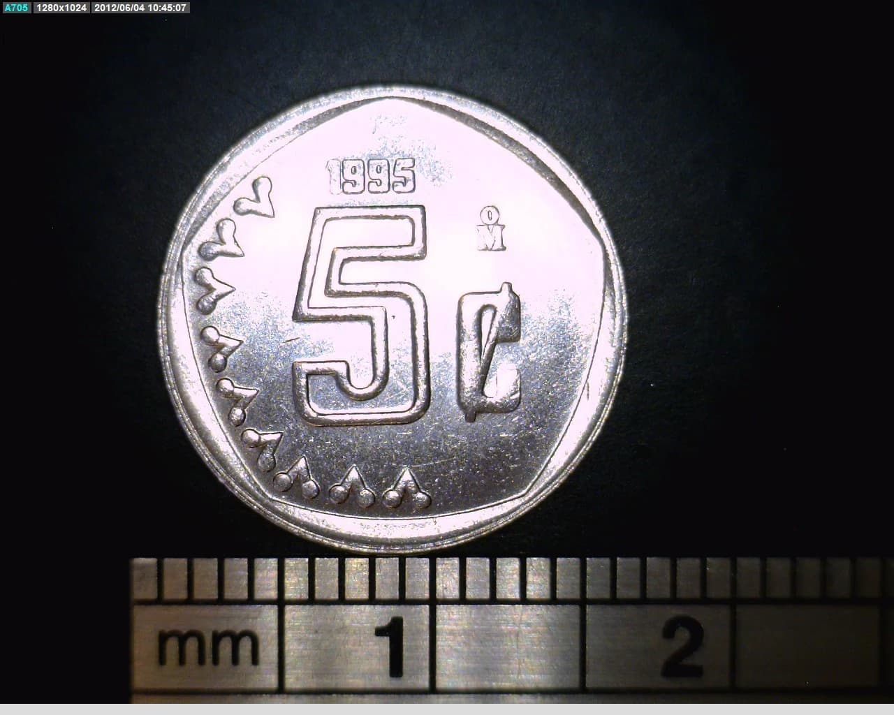 5 Acero inoxidable 1995 . Inventario Banxico 19010 (reverso)