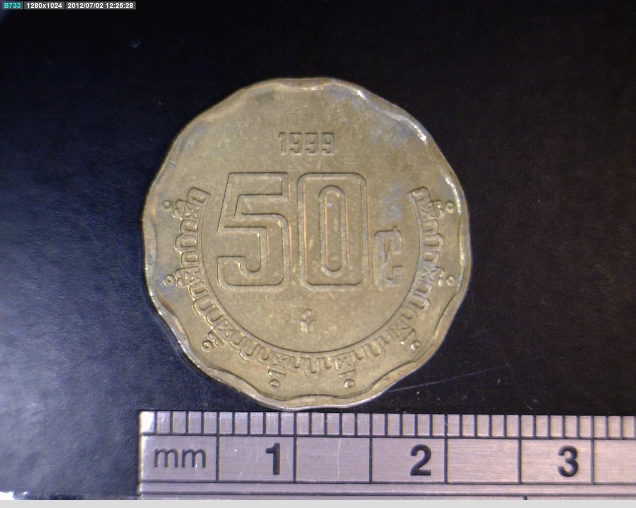 50 Centavos Bronce Aluminio 1999 · Reverso