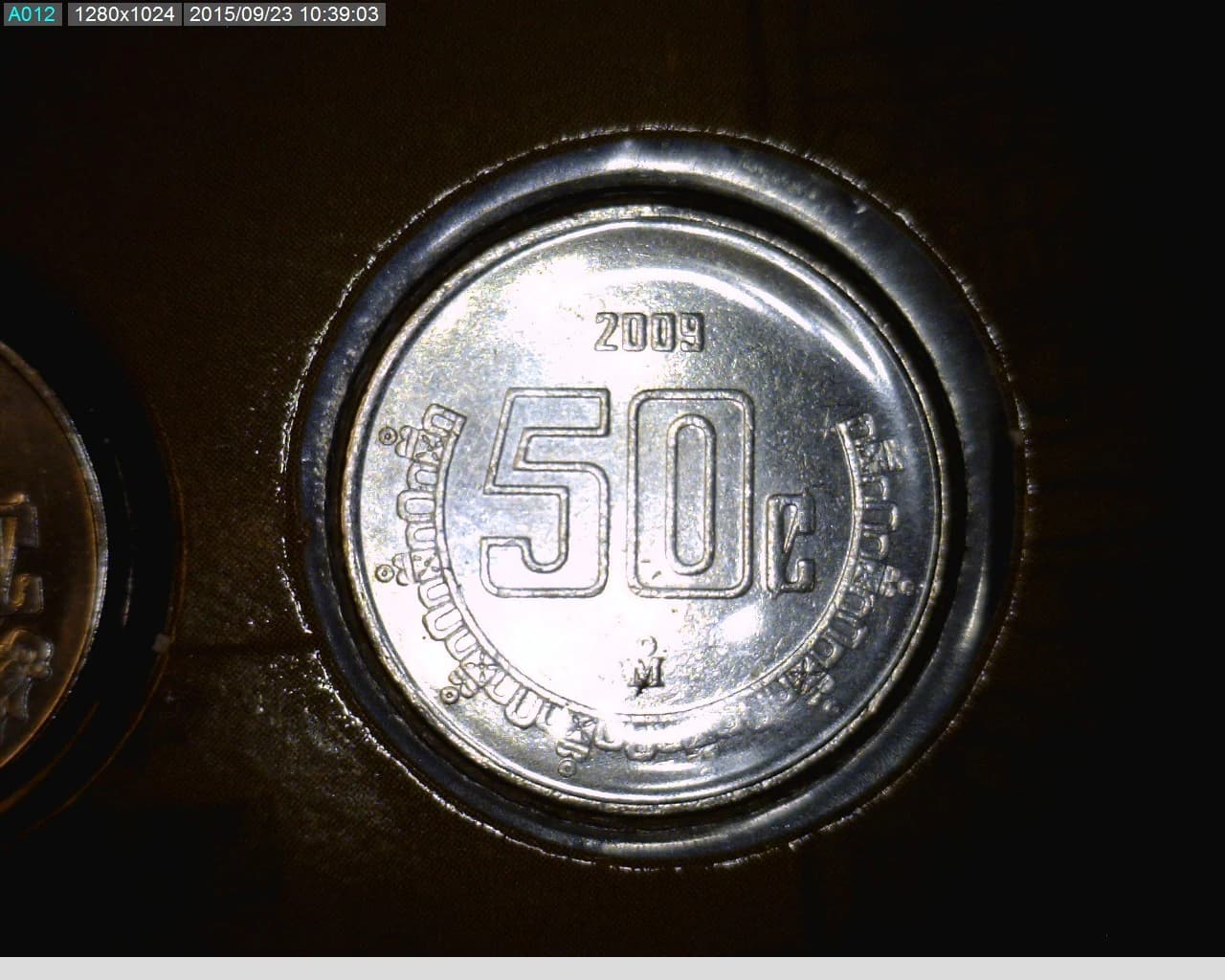 50 Centavos Acero inoxidable 2009 · Reverso