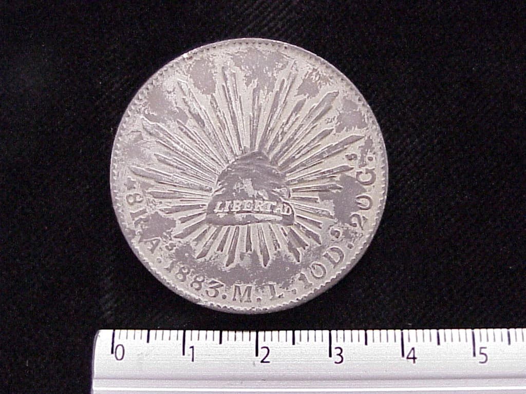 8 Plata 1883 . Inventario Banxico 5737 (reverso)