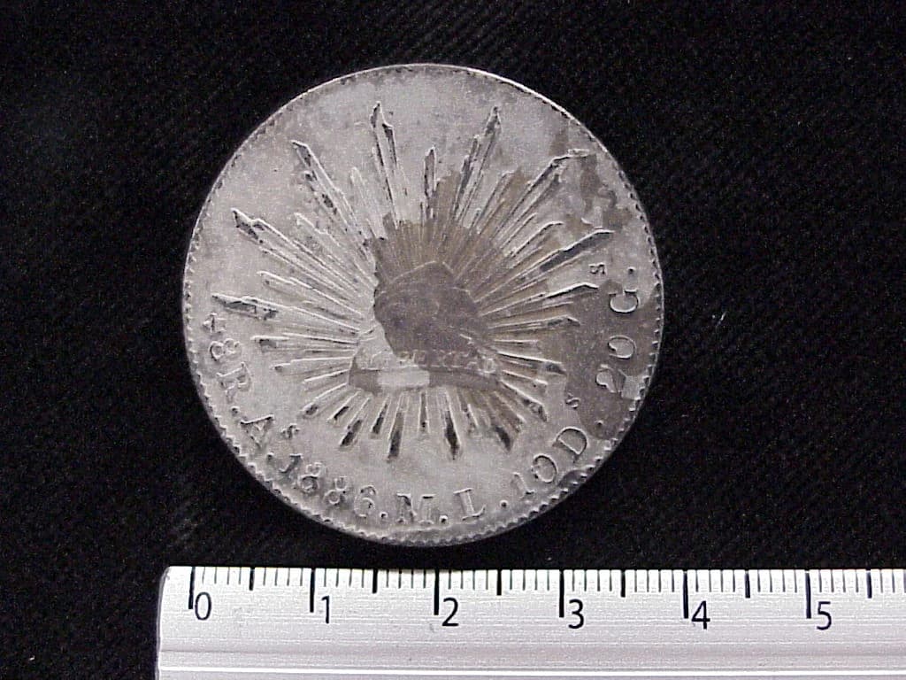 8 Plata 1886 . Inventario Banxico 5747 (reverso)