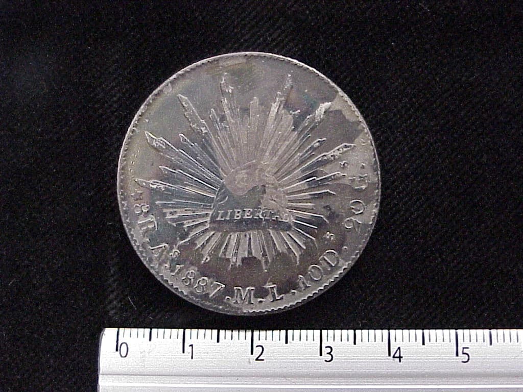 8 Plata 1887 . Inventario Banxico 5750 (reverso)