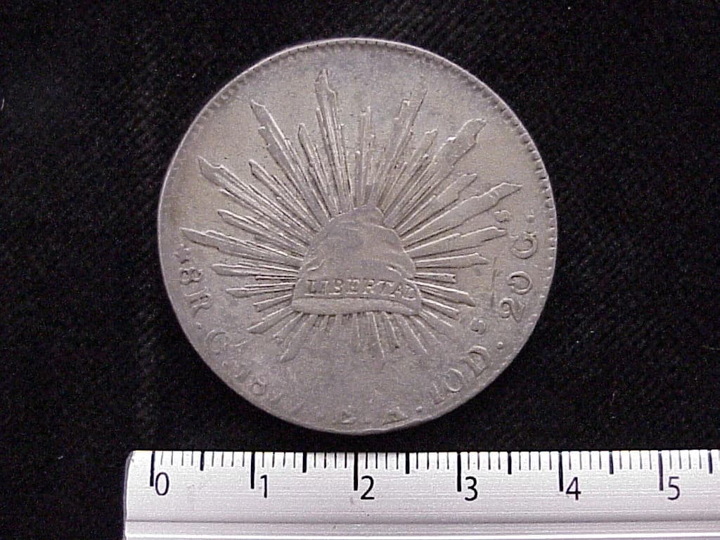 8 Plata 1877 . Inventario Banxico 6558 (reverso)