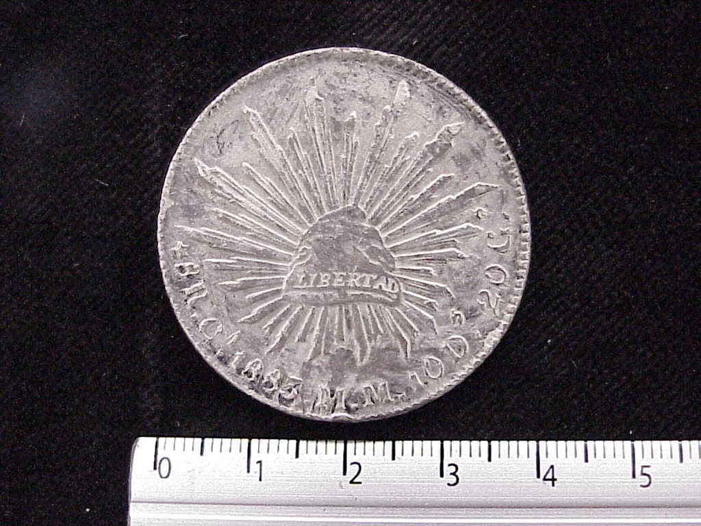 8 Plata 1885 . Inventario Banxico 6599 (reverso)
