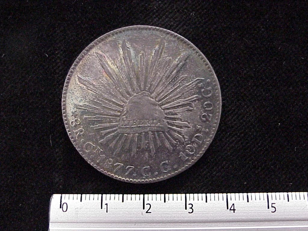 8 Plata 1877 . Inventario Banxico 6006 (reverso)