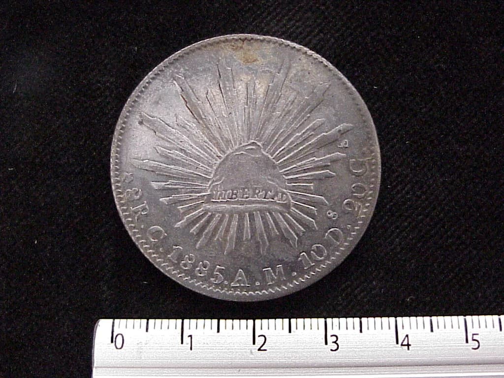 8 Plata 1885 . Inventario Banxico 6040 (reverso)