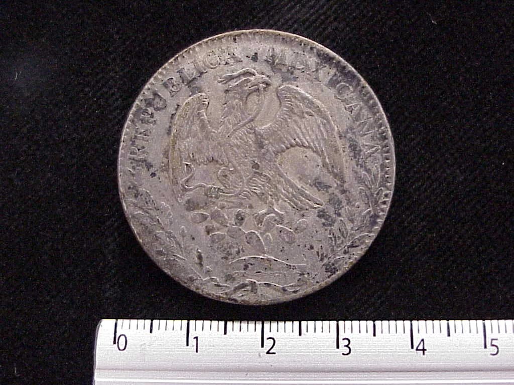 8 Plata 1885 . Inventario Banxico 7009 (reverso)