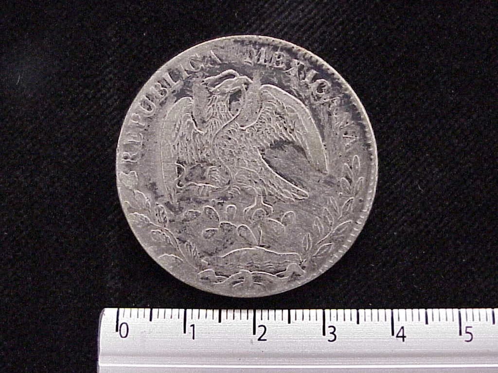 8 Plata 1886 . Inventario Banxico 7014 (reverso)