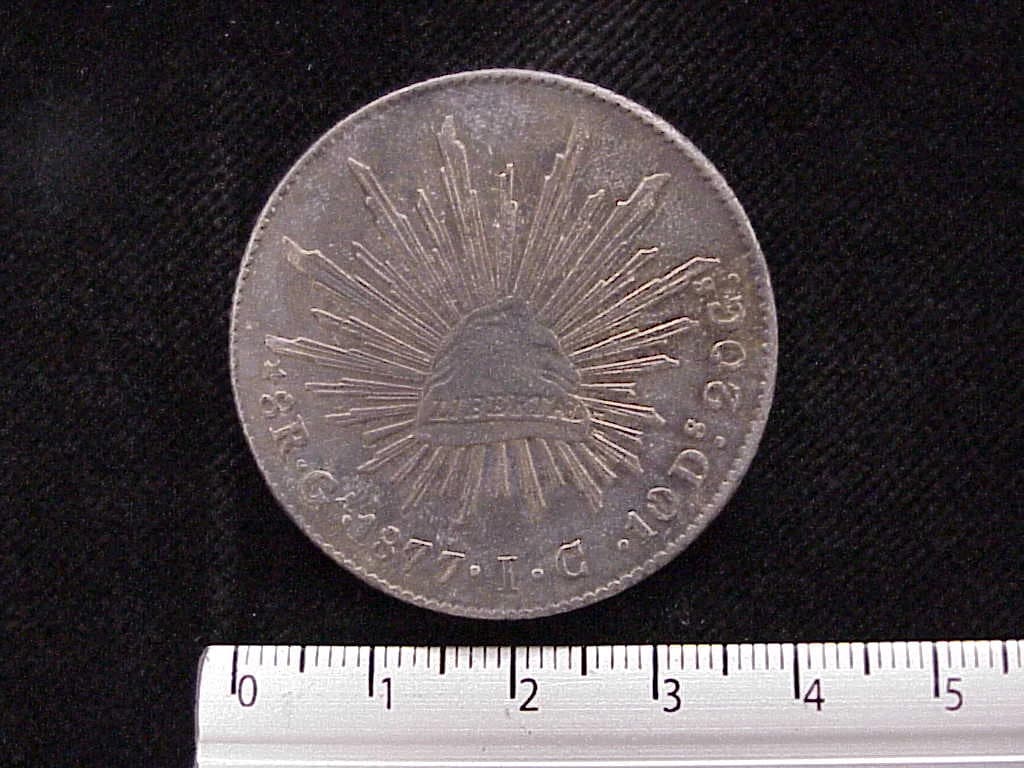 8 Plata 1877 . Inventario Banxico 7460 (reverso)