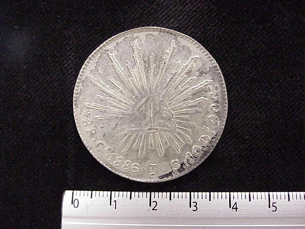 8 Plata 1886 . Inventario Banxico 7498 (reverso)