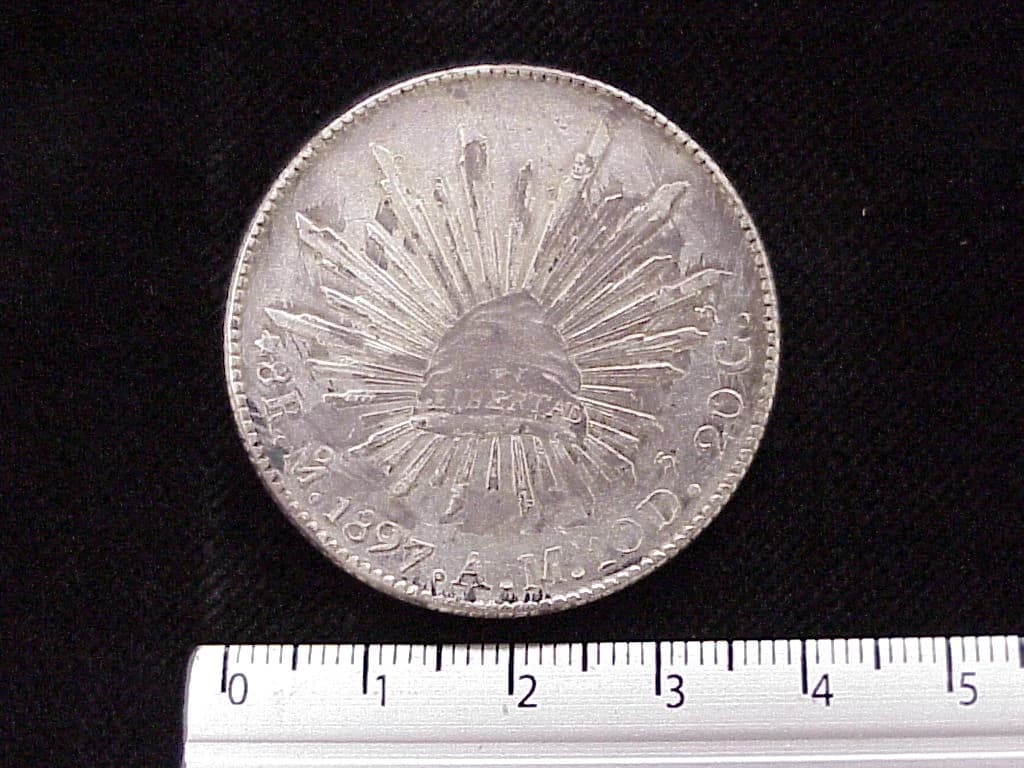 8 Plata 1897 . Inventario Banxico 4481 (reverso)