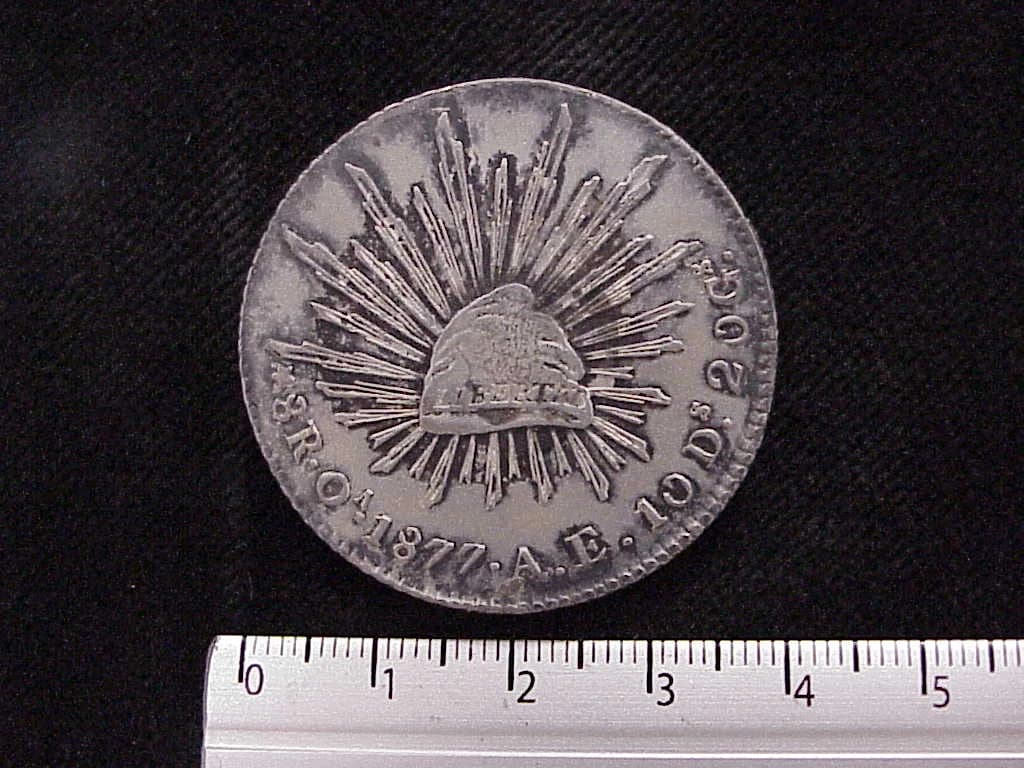8 Plata 1877 . Inventario Banxico 9420 (reverso)