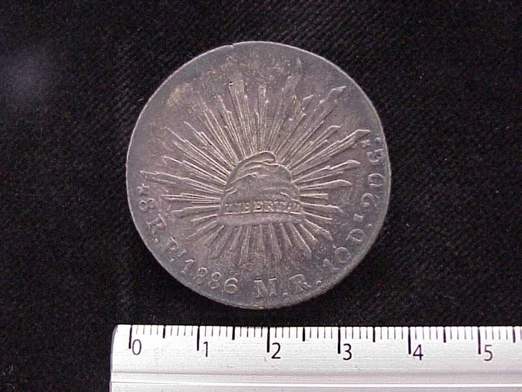 8 Plata 1886 . Inventario Banxico 9675 (reverso)