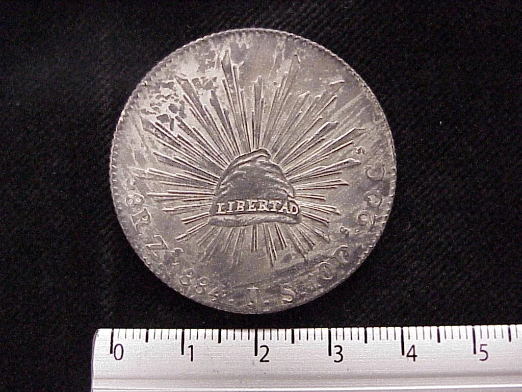 8 Plata 1884 . Inventario Banxico 10338 (reverso)