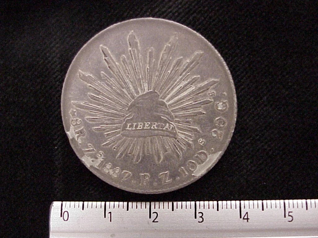 8 Plata 1887 . Inventario Banxico 10350 (reverso)